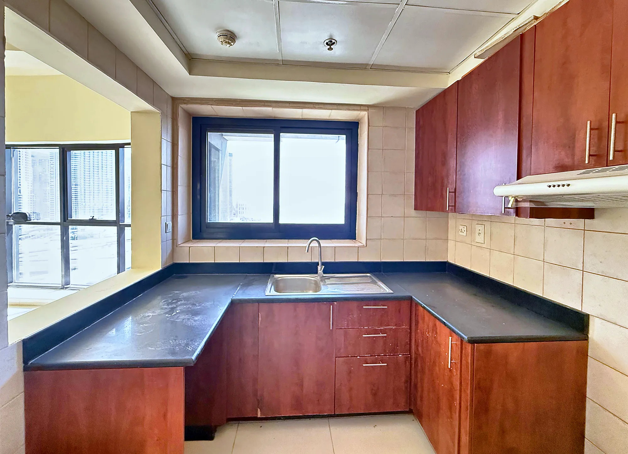 Closed kitchen with fitted cabinets