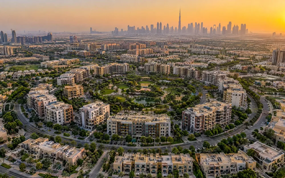 Jumeirah Village Circle from above at golden hour (illustration)